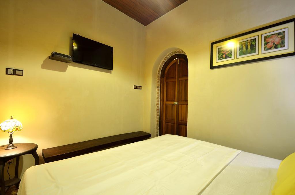 Yong Yi Yuen Guesthouse George Town Habitación foto